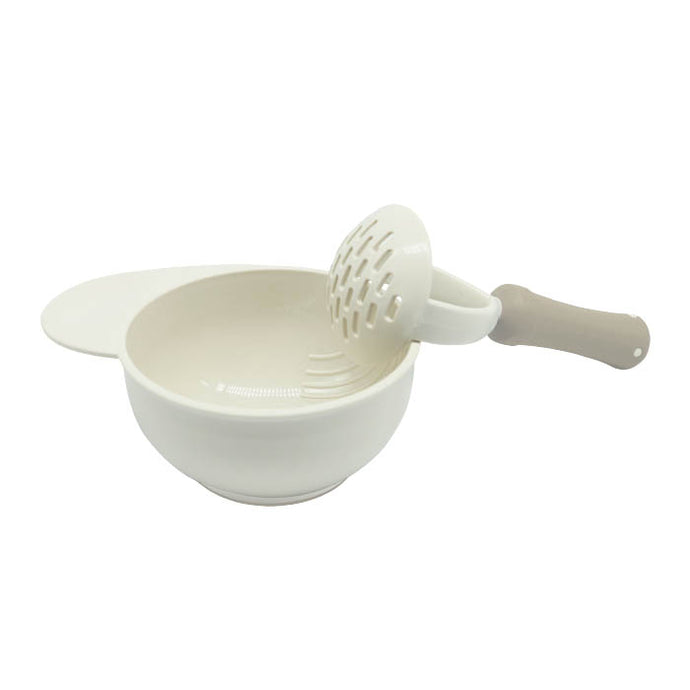 Baby Food Masher Bowl has a large handle and ridges in the bowl and comes with a hand masher.